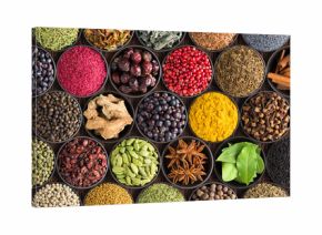 colorful spice background, top view. Seasonings and herbs for Indian food