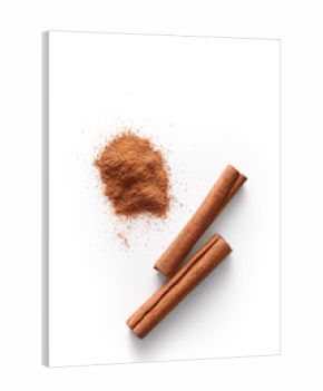 Cinnamon sticks and grounded cinnamon isolated on a white background. Cinnamon spice powder viewed from above. Top view.