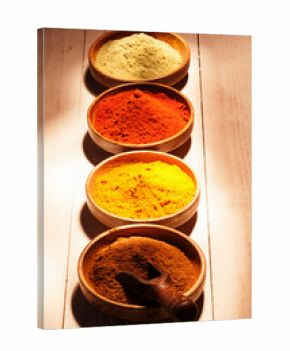 Line of colourful ground spice