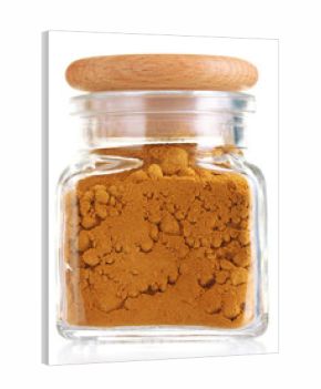 jar with spice isolated on white