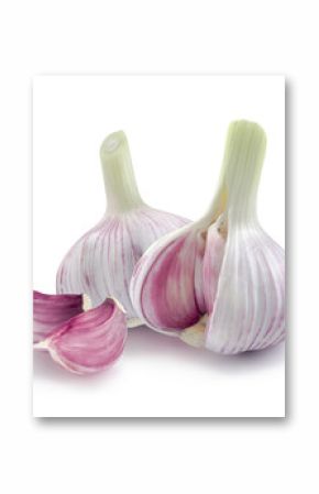 Two young garlic heads and cloves isolated on white background