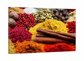 assortment of spices seasoning on a black stone