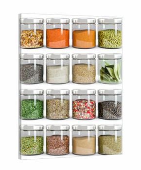 Set of spices in glass bottles, isolated on white background