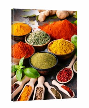 Variety of spices and herbs on kitchen table