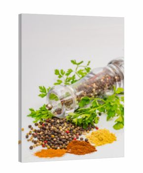 Fragrant black pepper on a white background, this is a common spice with useful properties obtained from seeds of plants of the genus Pepper