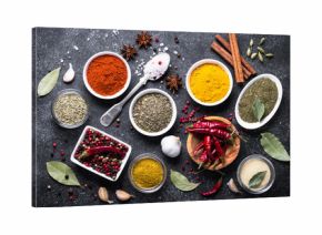 Set of Various spices on black stone table. 