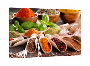 Variety of spices and herbs on kitchen table