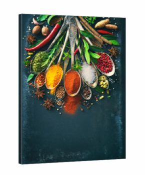 Various herbs and spices on dark background