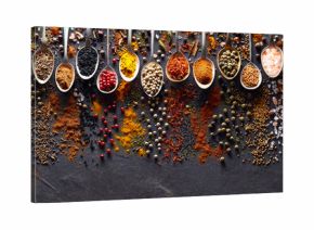 Spices on black graphite board