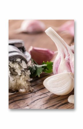 Garlic bulb and garlic cloves  on the wooden table.