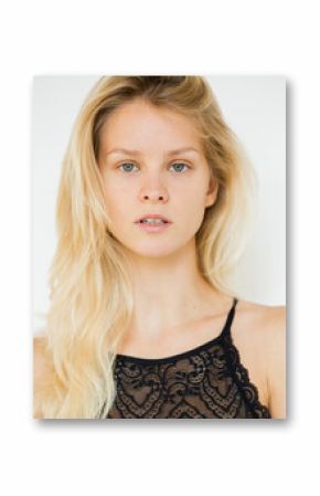 Portrait of a beautiful young woman on a white background