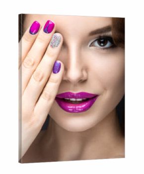 girl with a bright make-up and manicure with rhinestones. 