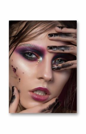 Beauty portrait of a young girl with fashion creative make-up