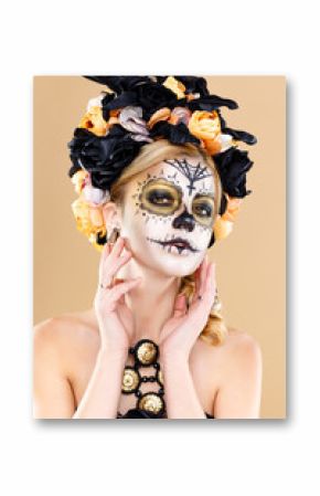 attractive young woman with sugar skull makeup,Dia de los Muertos - Mexican Day of the dead woman wearing sugar skull makeup and flower wreath.