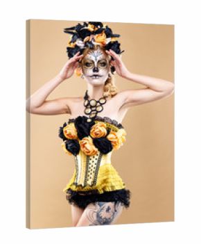 attractive young woman with sugar skull makeup,Dia de los Muertos - Mexican Day of the dead woman wearing sugar skull makeup and flower wreath.