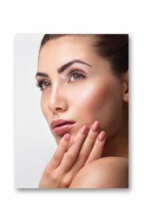 Beautiful Young Woman with Clean Fresh Skin. Close up Portrait.