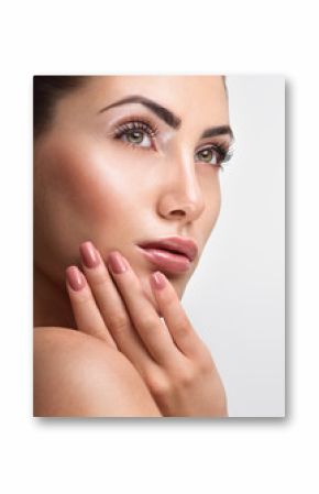 Beautiful Young Woman with Clean Fresh Skin. Close up Portrait.