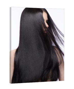 Beautiful brunette girl in move with a perfectly smooth hair, and classic make-up. Beauty face. 