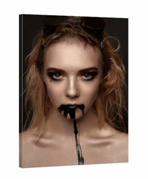 Beauty blonde Woman black Paint from her Mouth