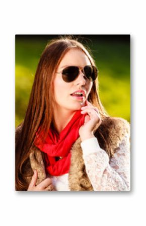 Portrait girl relaxing walking in autumnal park.