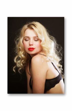 blond woman with  curly hair in black lingerie