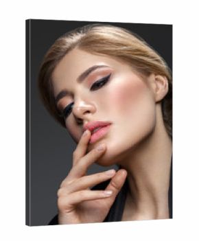 Beautiful girl with cat eye make-up