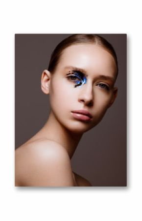 Beauty fashion model with black and blue makeup