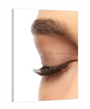 Woman with closed eyes and long eyelashes on white background, closeup