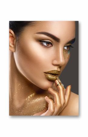 Fashion art makeup. Portrait of beauty woman with golden skin. Glamour shiny professional makeup