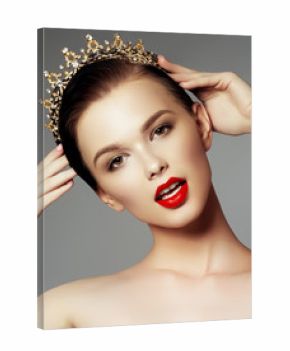 Beauty face. Makeup artist concept. Cute girl applies red lipstick . Beautiful woman face. Make-up master, painting lips of young beauty model girl. Make up in process