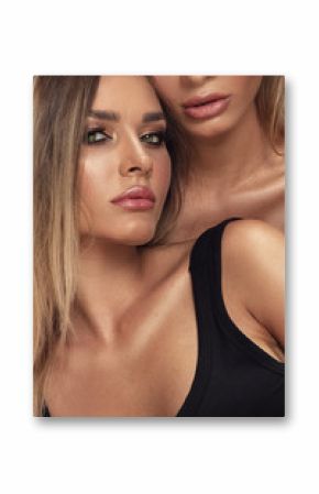 Two attractive twins women in glamour makeup