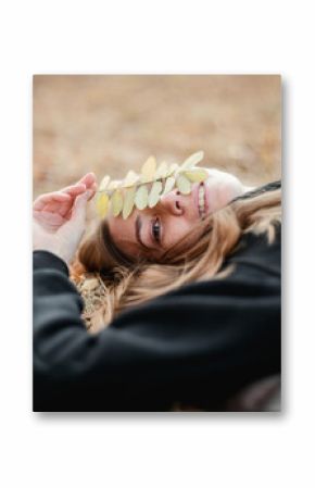 Happy young girl in the autumn forest