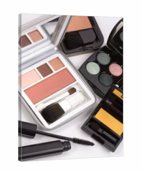 Macro shot of blush and eyeshadow palettes