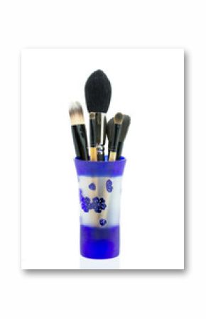 cosmetic brushes in glass