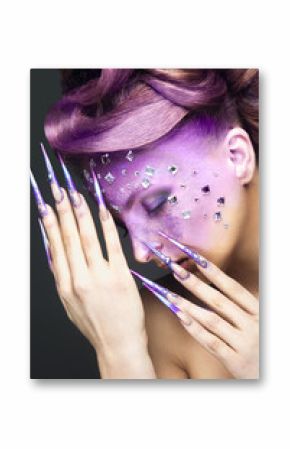 Girl with creative makeup  and long nails.