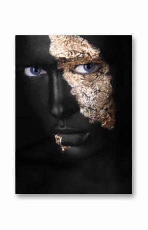 fashion portrait of a dark-skinned girl with gold make-up. Beauty face.