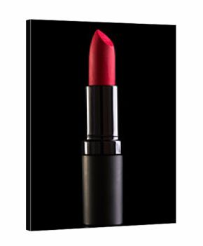 Red lipstick isolated on black background