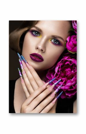 Beautiful girl with colorful make-up, flowers, retro hairstyle and long nails. Manicure design. The beauty of the face.