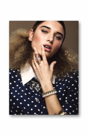 Beautiful girl with classic make-up and hairstyle art, clothing retro style. Beauty face. Photos shot in studio