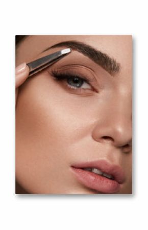 Beauty Woman Makeup. Closeup Of Beautiful Glamorous Sexy Woman Face With Smooth Skin Plucked Eyebrows And Metal Tweezers. Young Female Model Shaping Brows. Beauty And Skin care. High Resolution