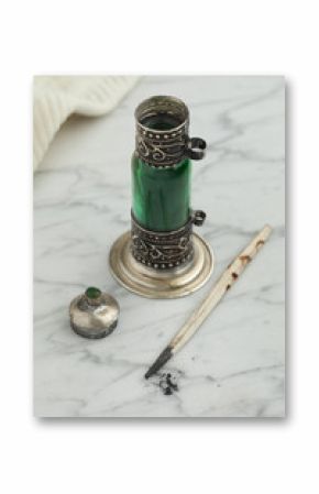 Moroccan green bottle with black kohl