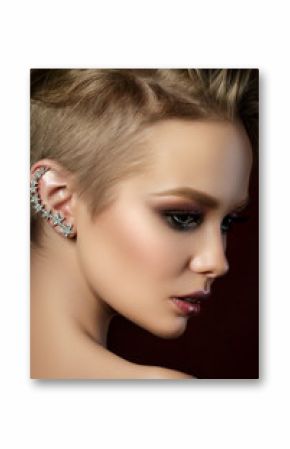 Beauty portrait of young woman with fashion makeup