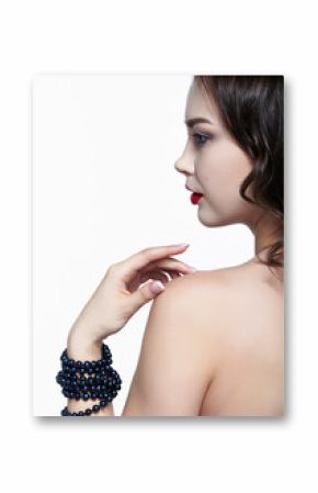 Portrait of young brunette woman on white background. Girl with necklace on the wrist