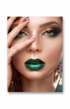 Beautiful redhair model: curls, bright makeup, jewelry and green lips. The beauty face.