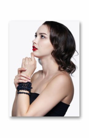 Portrait of young brunette woman on white background. Girl with necklace on the wrist