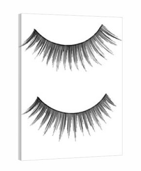 close up of artificial eyelashes on white background