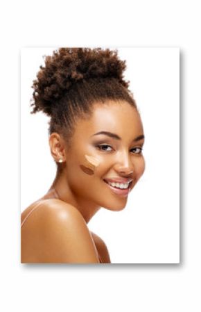 Beautiful smiling woman with tone cream lines on her face. Photo of african american girl with perfect makeup on white background. Skin care concept