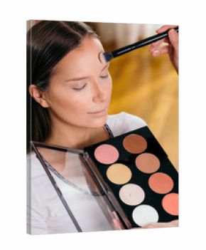 Make up artist working in a studio
