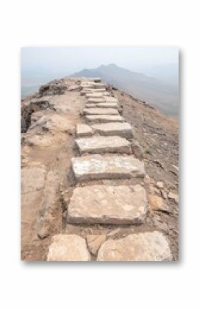 Stone Steps Leading to a Mountain Peak in Morning Haze