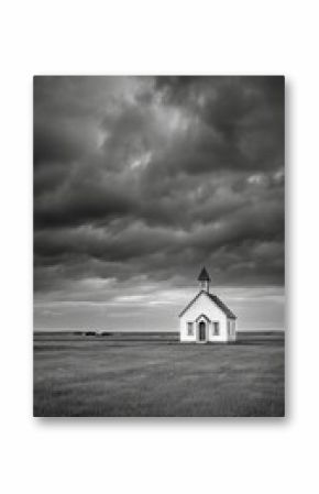 Lonely Chapel Stands in Vast Field Under Dramatic Cloudy Sky at Dusk